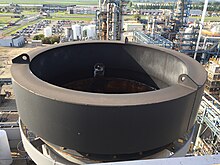 image of Tuned Mass Damper on top of a chimney