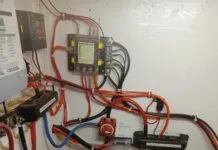 The batteries pictured are Rolls S6 250 flooded cells, nominally 281 a/hr. They came with the boat and are of unknown age but currently seem to work OK. They are not the cell I would pick as they are a lightweight battery. The clue is that the spec sheet gives a CCA number. True deep cycle cells don't have that. The taller L16-EX is rated at three times the cycle life, about 3,750 cycles to 50% DoD compared to these at 2,000. You really do need to look at the full spec to know what you are getting! In Canada these are currently around $320 com-pared to the L16 at $590. The black battery is the starter battery which is a simple H/D car battery that starts the engine and supplies the windlass. (Photo/ Roland Stockham)
