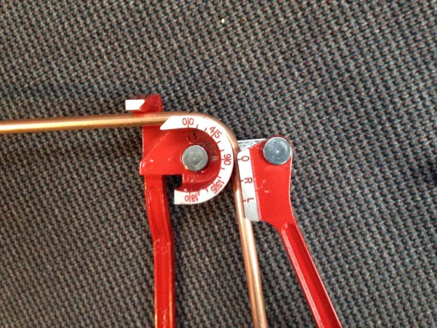 Pipe bender post bend