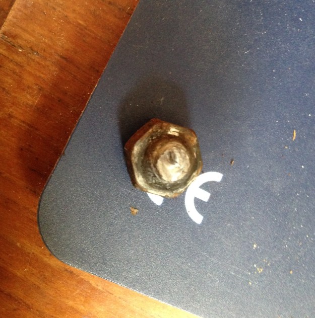 Remains of the exhaust elbow bolt