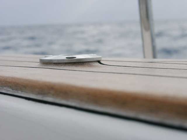 This is how worn teak decks can become after only five years of regular scrubbing and sanding