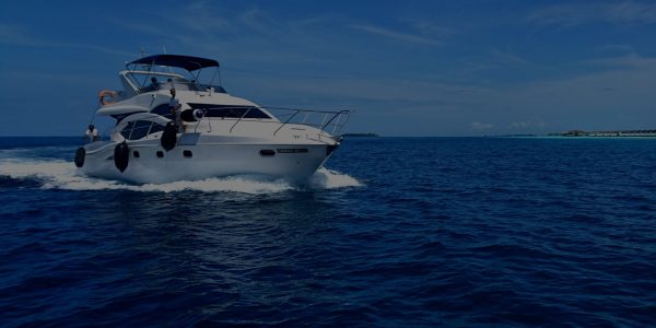 yacht in blue ocean under the tropical sun