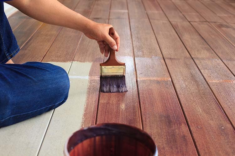 hand painting oil color on wood floor use for home decorated ,house renovation and housing construction theme